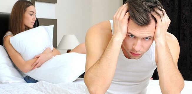Mann und Frau auf dem Bett